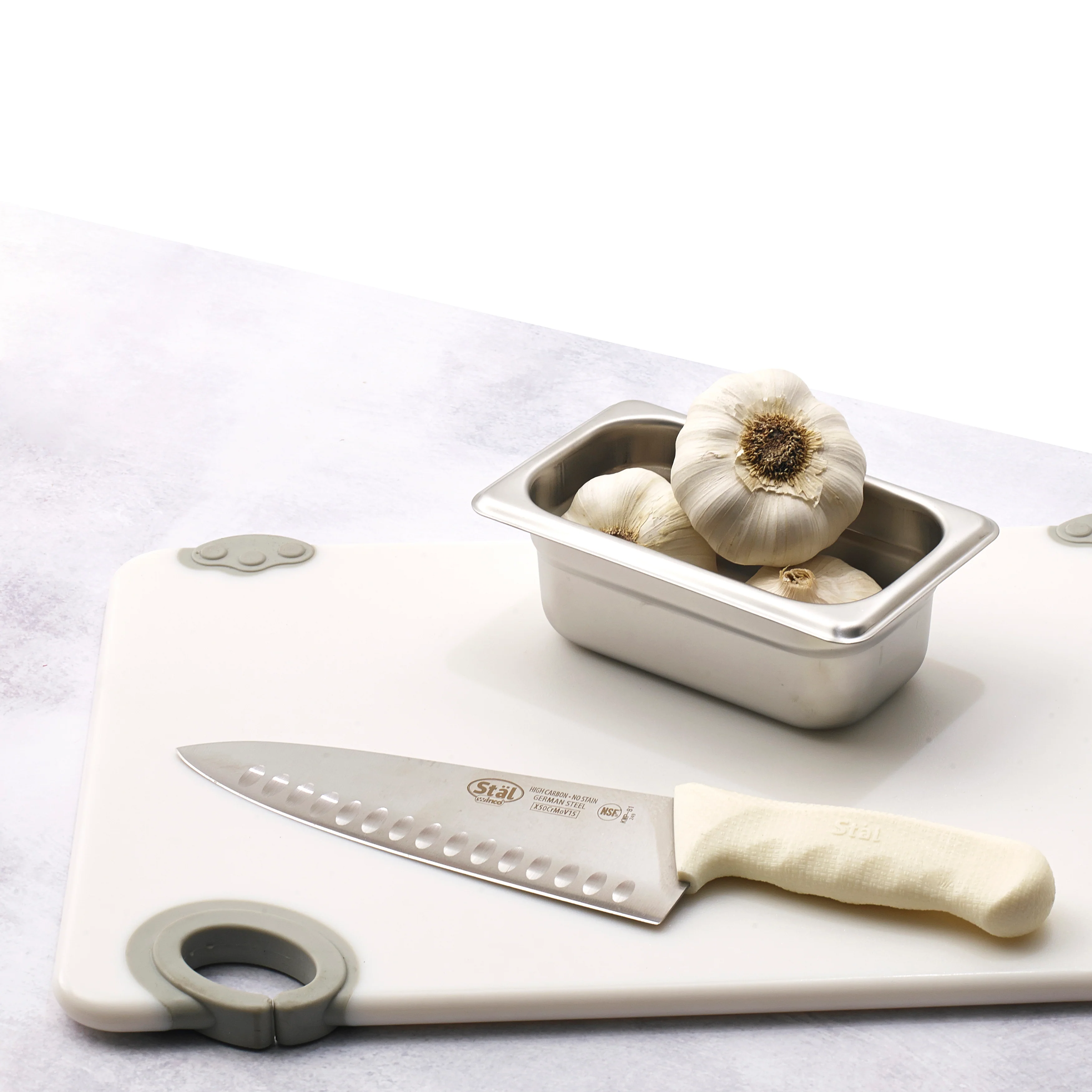 Winco CBN-1218WT 12 Inch Rectangular Cutting Board with Rubber Grip Hook White Co-polymer - Image 5